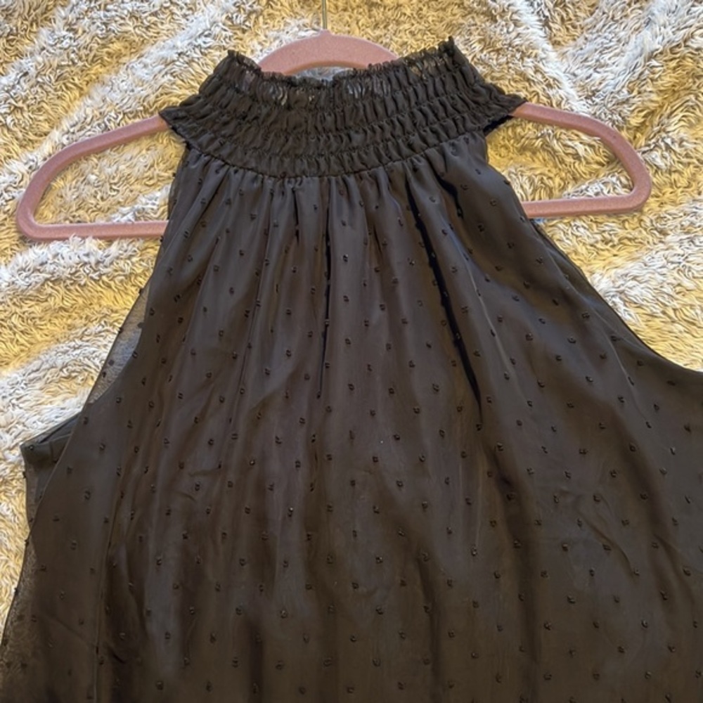 Black dress with Swiss dot design size large 
Smocked halter neckline. Baby doll